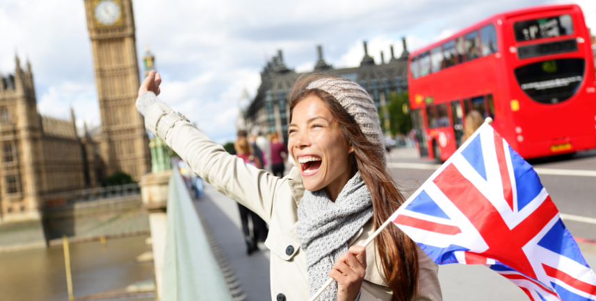 UK checkedin happy woman